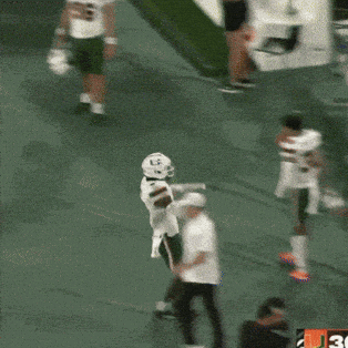 Football Player With Helmet Letter G Jumping