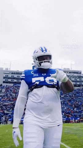 Football Player With Helmet Number 25 GIF