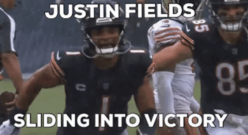 Football Player With Justin Fields Sliding Into Victory GIF