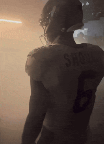 Football Player With Shone On Shirt GIF