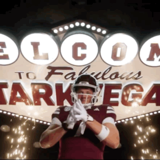 Football Player with Welcome to Fabulous Tarnega Sign