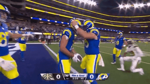 Football Players Celebrating Touchdown