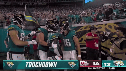 Football Players Celebrating Touchdown