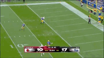 Football Players Celebrating Touchdown on TV