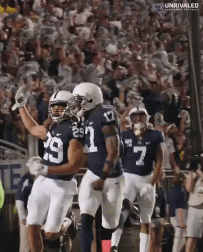 Football Players Celebrating Touchdown
