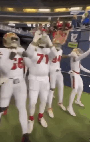 Football Players Dancing In Stadium GIF