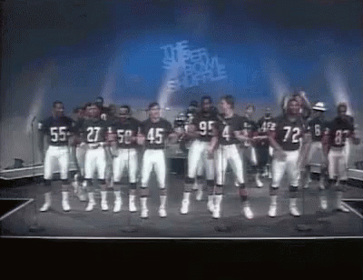 Football Players Dancing on Stage Saying It's a Wonderful Life