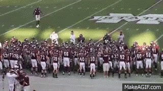 Football Players Hands in Air