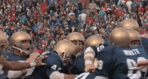 Football Players Huddle