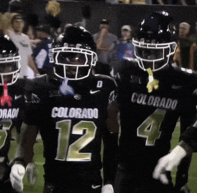 Football Players In Black Colorado Uniforms GIF