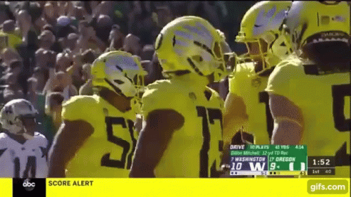 Football Players In Yellow Jerseys Number 5 GIF