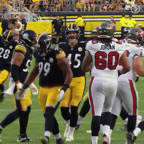 Football Players Including Number 60 Jordan