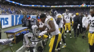 Football Players Including Number 65 And Reed GIF