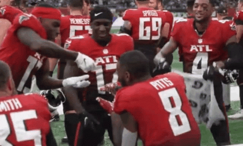 Football Players Kneeling, Number 8 Jersey GIF