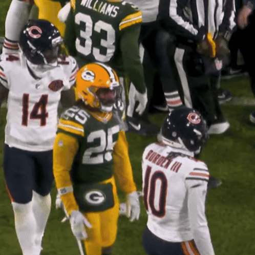Football Players Number 10 and 33 Talking