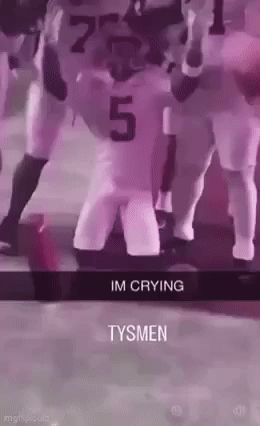 Football Players On Field One Crying GIF