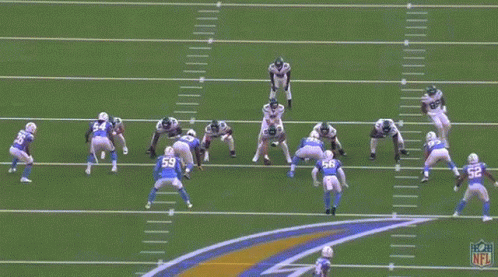 Football Players On Field With NFL Logo GIF