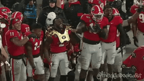 Football Players on Field With Number 10 Jersey