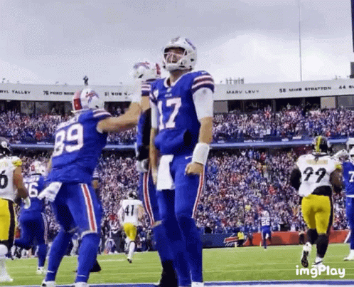 Football Players On Field With Number 17 GIF