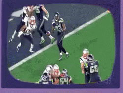 Football Players On Field With Number 64 GIF