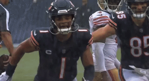 Football Players On Field With Number 8 Jersey GIF