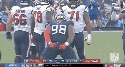 Football Players On Field With Number 98 Jersey GIF
