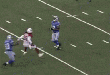 Football Players Playing Game With Referee GIF