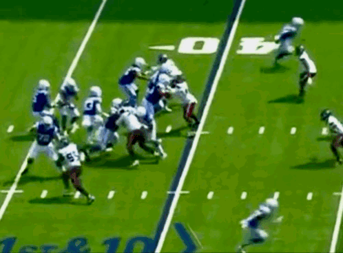 Football Players Playing On Field With Number 30 GIF