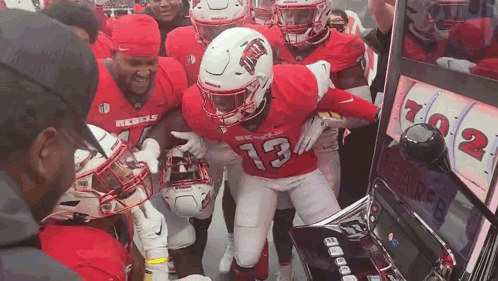 Football Players Playing Slot Machine Number 13 Jersey