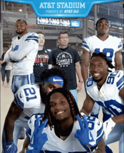 Football Players Posing at AT&T Stadium