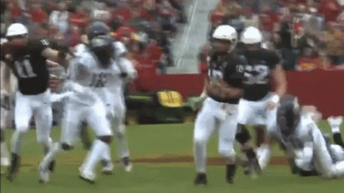 Football Players Running Number 52 Jersey
