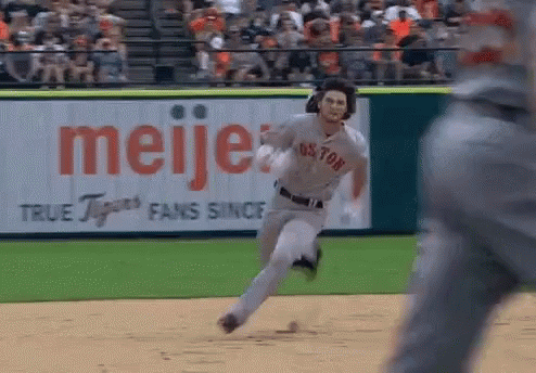 Football Players Standing On Field GIF