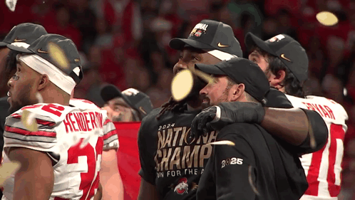 Football Players Wearing National Champs Shirts