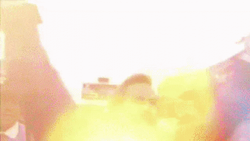 Football Players With Kneeling Man GIF