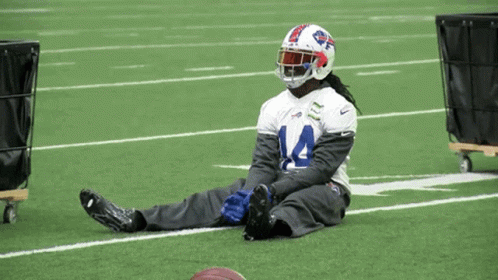 Football Sitting Catch GIF