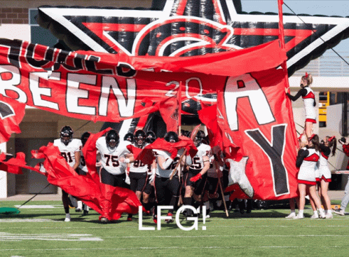 Football Team Carrying Future Banner