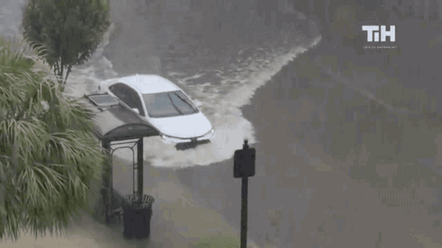 Forced Driving White Car Flood Turn GIF