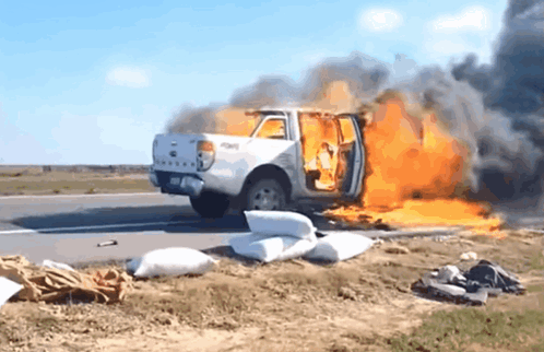 Ford Endeavour Catches Car Explosion GIF