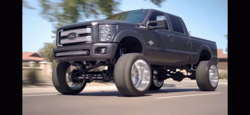 Ford In Big Tires GIF