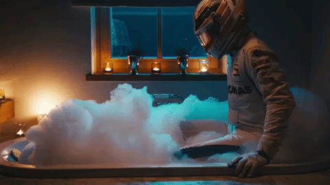 Formula One Rider Soaking In Bubble Bath GIF