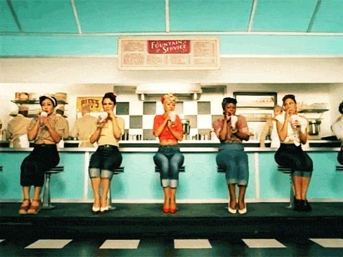 Fountain Service Sign Above Women At Counter GIF
