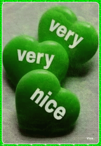 Four Green Hearts With The Words Very Nice On Them GIF