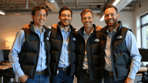 Four Men Wearing Vests With The North Face On Them GIF