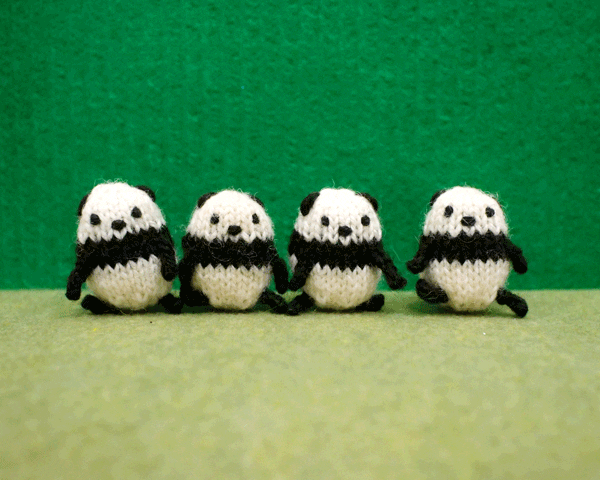 Four Panda Toys Bow GIF