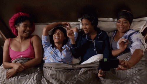 Four Women Laughing And Holding Hands GIF