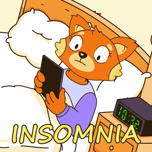 Fox Lying in Bed Looking at Tablet Insomnia