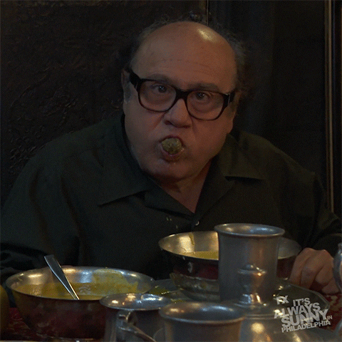 Frank Reynolds Biting A Meatball GIF