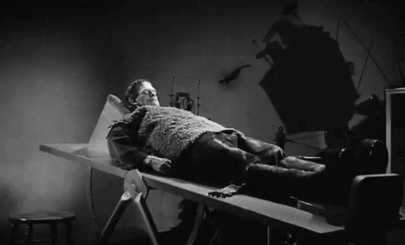 Frankenstein Waking Up Confused Vintage Clip GIF