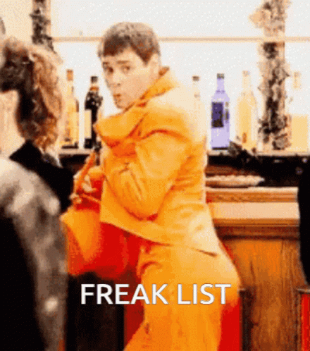 Freaky Jim Carrey Yellow Suit GIF