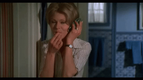 Freaky Reaction Talking On Phone GIF